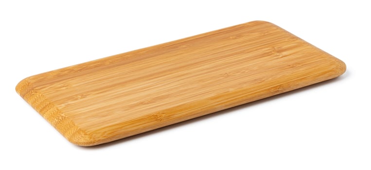 Wooden board isolated on white background, close up photo