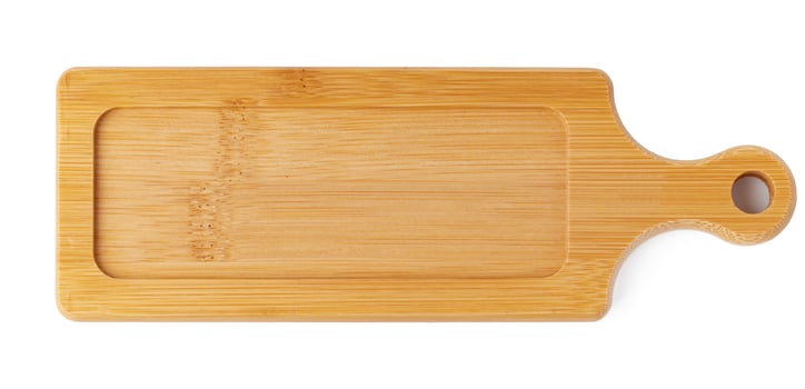 Wooden board isolated on white background, close up photo