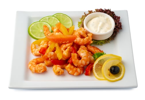 Cooked prawns on white tray isolated on white photo