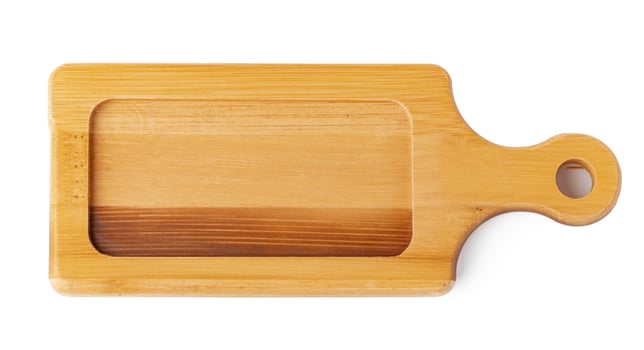Wooden board isolated on white background, close up photo