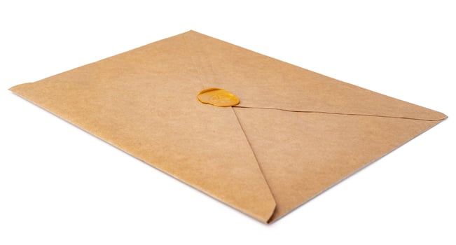 Recycled craft paper envelope isolated white background photo