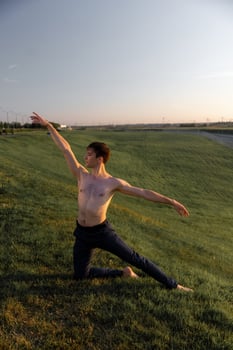 Summer activity and energy. Ballet dancer. Handsome man workout and stretching. photo