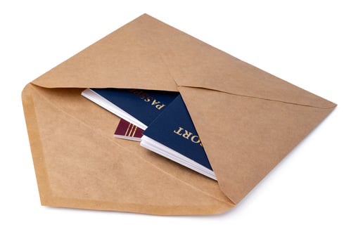 envelope with passport isolated on white photo