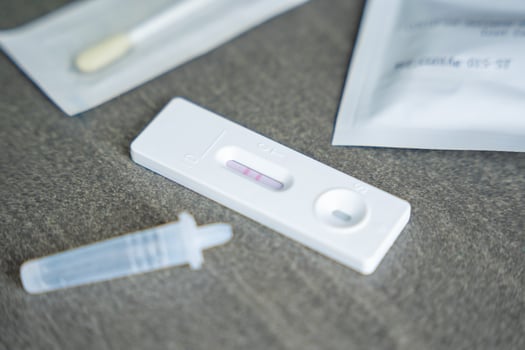 Rapid Antigen Test kit with with Positive result during swab COVID-19 testing. Coronavirus Self nasal or Home test, Autumn exacerbation of viruses. High quality photo