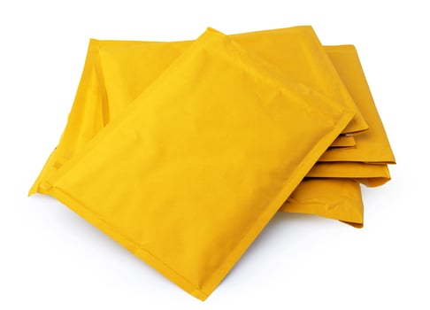 Thick envelope on a white background photo