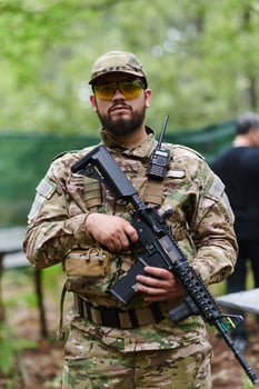 Elite soldier exudes focused determination and readiness, geared up for a perilous military operation, capturing the essence of courage and professionalism in the face of imminent danger photo