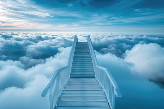 Stairway leading to a blue sky with clouds photo