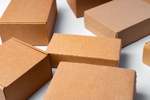 Lot of cardboard boxes on white background photo