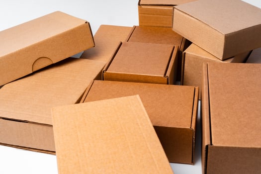 Lot of cardboard boxes on white background photo