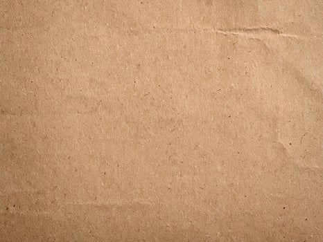 Recycled paper background. Old brown paper texture or background. photo