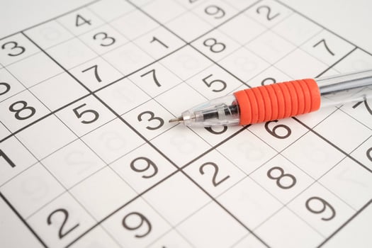 Sudoku puzzle, game to play for keep you brain younger for developing Alzheimer disease in senior patient. photo