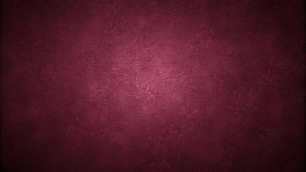 Dark burgundy abstract background with smooth color gradient and rough texture grainy noise shot from a low angle photo