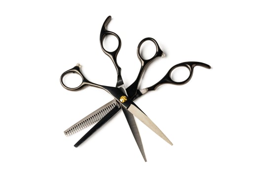 Scissors for haircuts isolated on white background photo