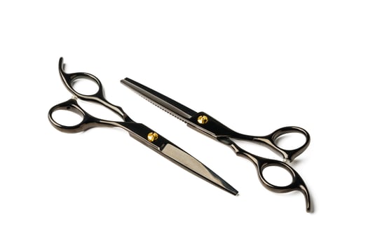 Scissors for haircuts isolated on white background photo