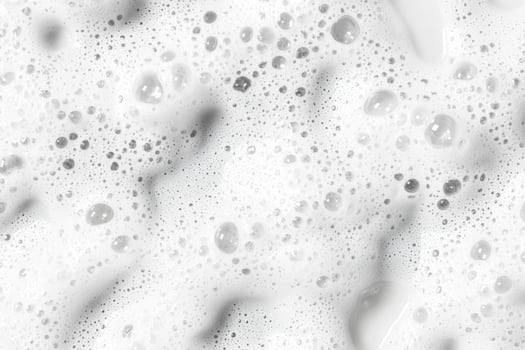 Abstract white soap foam bubbles texture background photo
