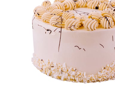 Delicious whole coconut cream cake on white background photo