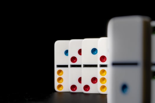 Domino game. Dominoes on a black table photo