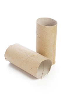 Empty toilet paper on white background photo