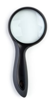 Magnifying glass isolated on white background photo