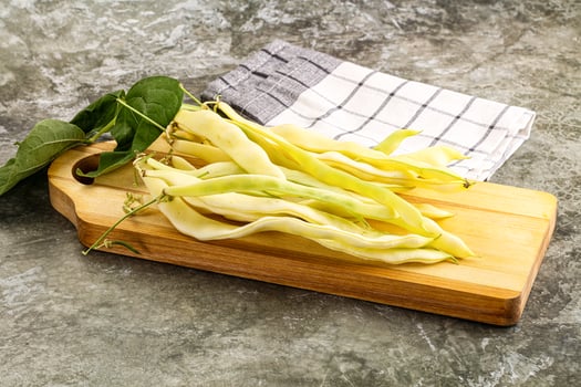 Raw green bean strings heap photo