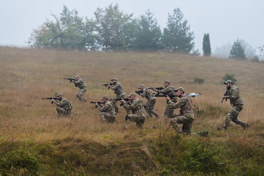 A disciplined and specialized military unit, donned in camouflage, strategically patrolling and maintaining control in a high-stakes environment, showcasing their precision, unity, and readiness for photo
