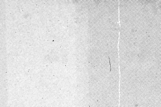 scanned paper, Halftone faded gradient texture. Grunge halftone grit background. White and black sand noise effect overlay photo