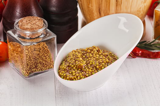 Spicy mustard sauce with seeds photo
