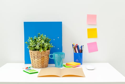 Office desk table with supplies photo