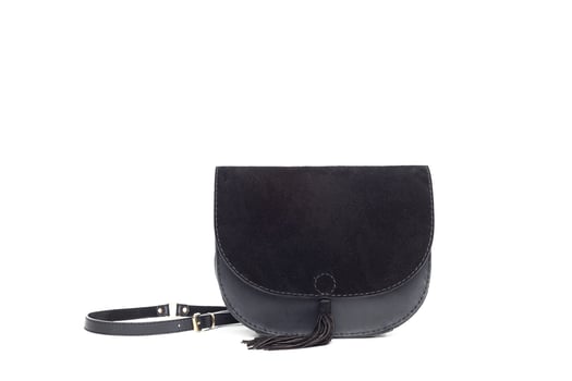 Leather female handbag isolated on white photo