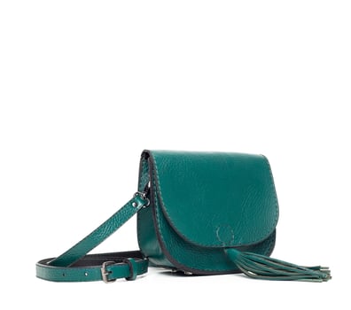 Leather female handbag isolated on white photo