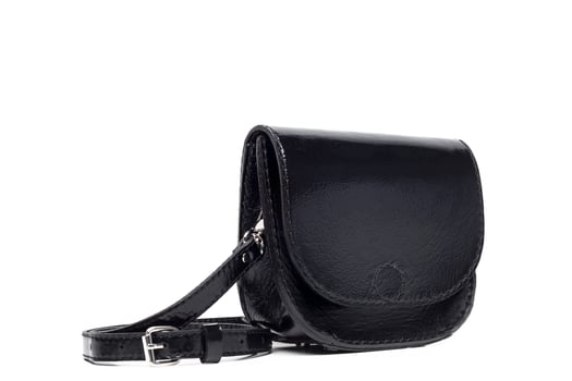 Leather female handbag isolated on white photo