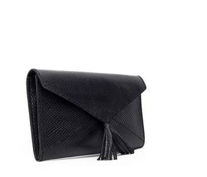 Leather female handbag isolated on white photo