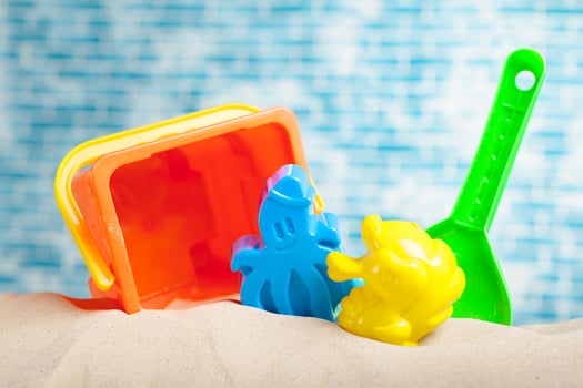 Children's toys on sand photo