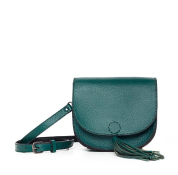 Leather female handbag isolated on white photo