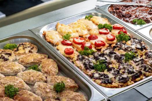 Display with fresh cooked food in a canteen photo