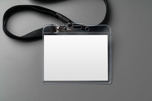 Blank nametag on gray background copy space photo