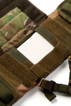 Close up of tactical bulletproof vest on white background photo