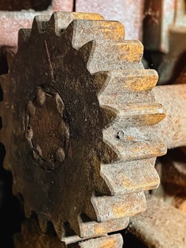Aged Cogwheel part of old machine in factory, photo