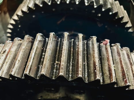 Cogwheel and worm gear lubricant with grease,part of machine in factory photo