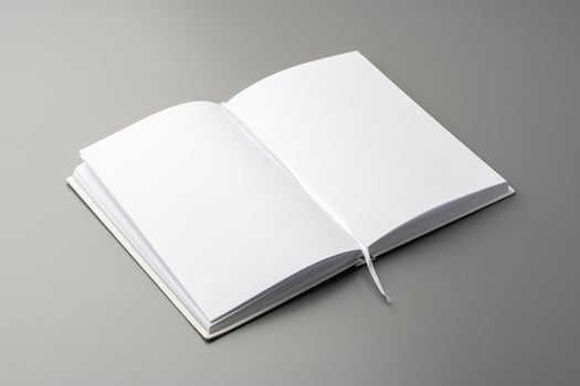 Blank notepad on gray background studio shot photo
