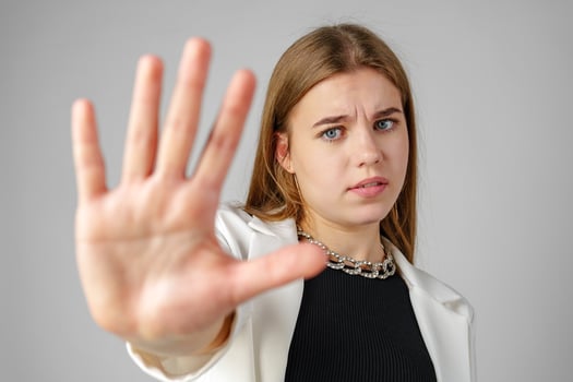 Young Woman Making Stop Sign With Hand photo
