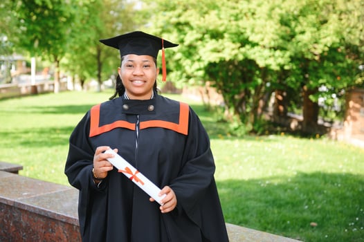 pretty african female college graduate at graduation photo