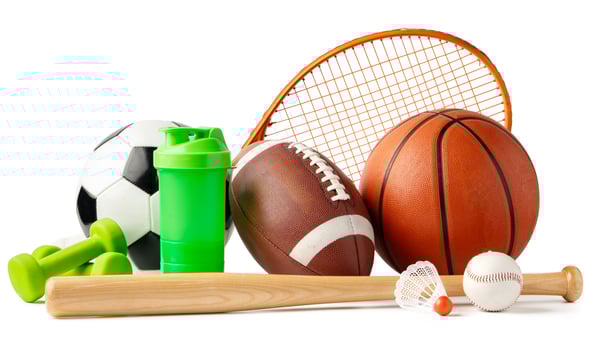 Assorted sports equipment isolated on white background photo