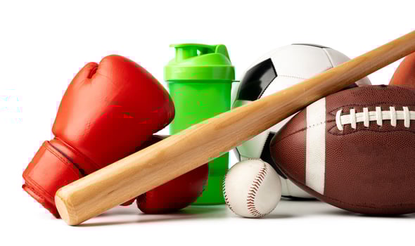 Assorted sports equipment isolated on white background photo