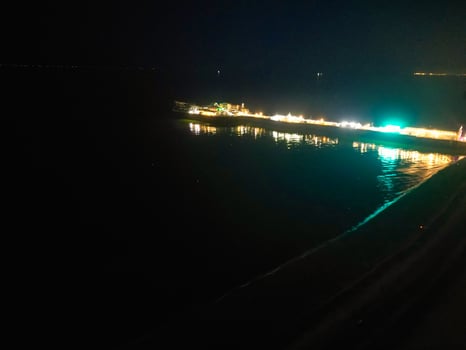 Aerial View of Illuminated Brighton and Hove City of England United Kingdom During Dark Night of May 9th, 2024 photo
