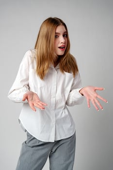 Young woman in a state of shock or surprise photo