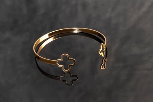 Bracelets. Women's jewelry on a dark background. Metal products. Fashion. photo