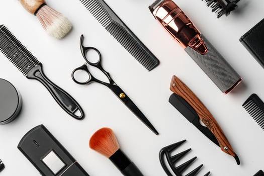 Pattern of various shaving and bauty care accessories for men on gray background photo