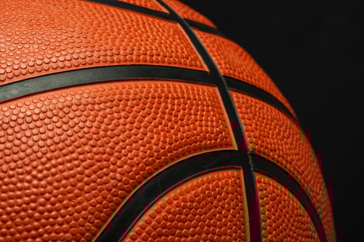 Close Up of Basketball on Black Background photo