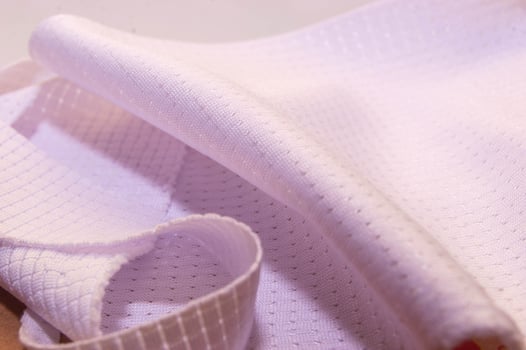 dry fit jersey fabric with motifs inside and out. photo